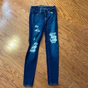 American eagle superstretch regular jeans size 2 with rips.